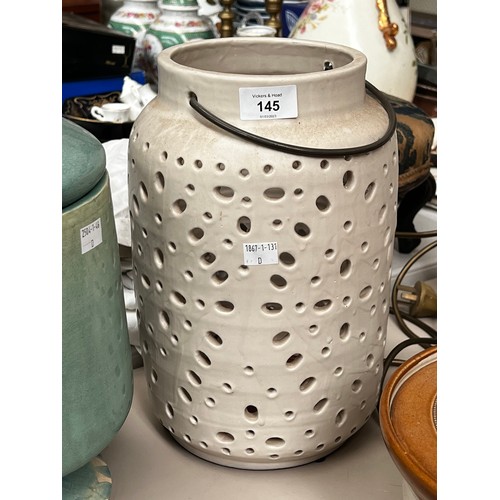 Modern pierced glazed terracotta