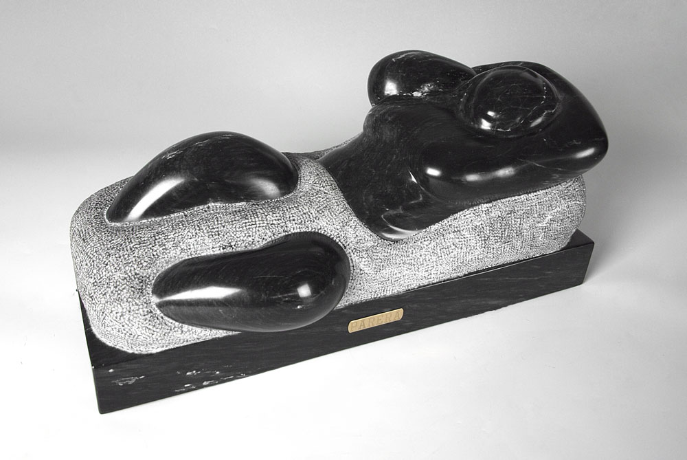 MODERNIST CARVED AND POLISHED