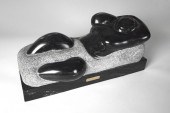 MODERNIST CARVED AND POLISHED