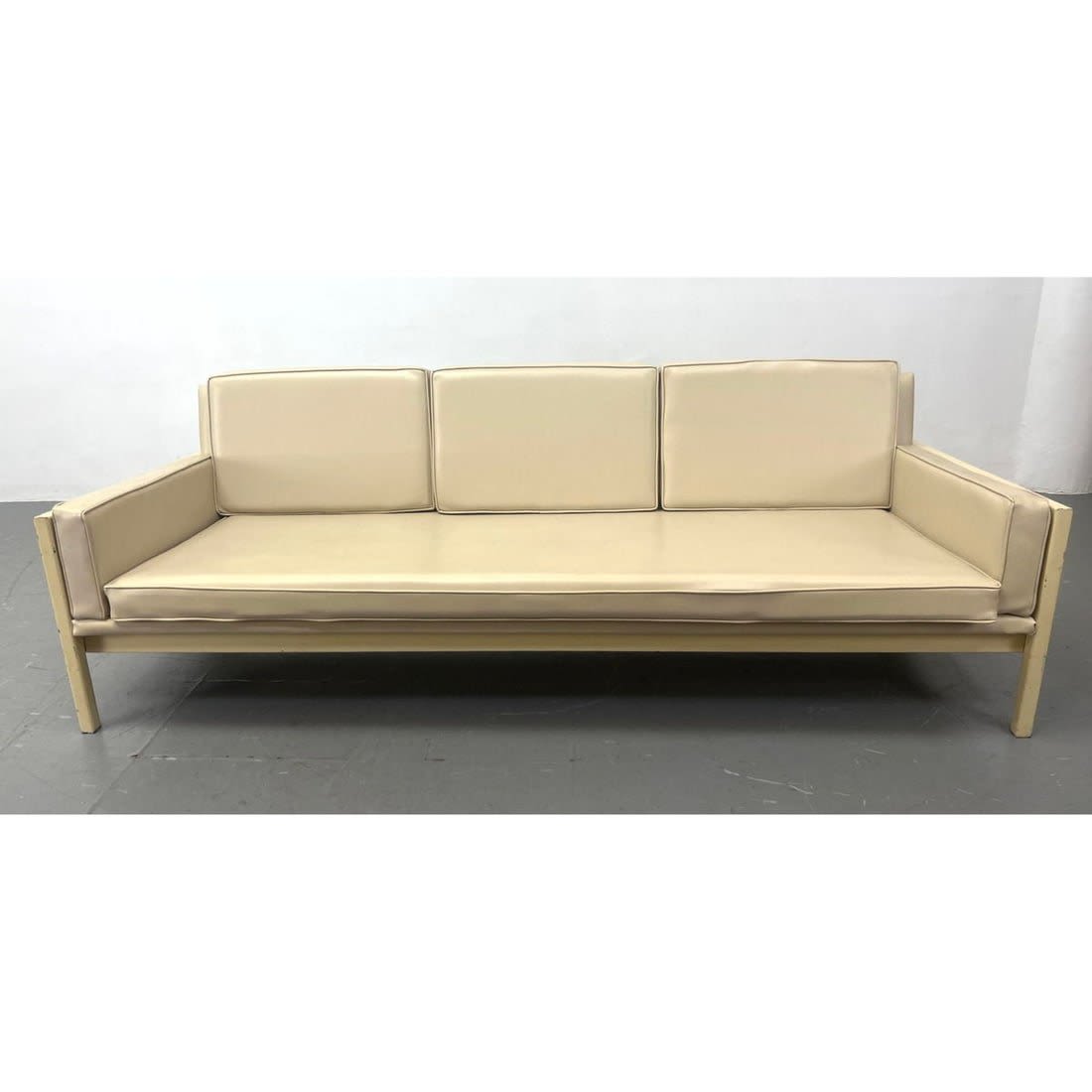 Modernist Cream Vinyl Sofa Couch.