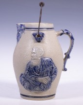 MOLDED STONEWARE PITCHER WITH