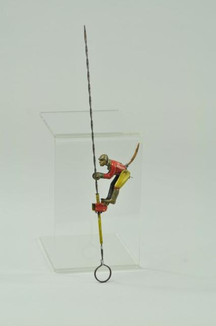 MONKEY ON SPIRAL PENNY TOY