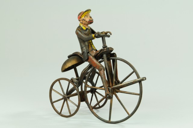 MONKEY ON TRICYCLE BELL TOY J&E