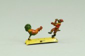 MONKEY WITH ROOSTER PENNY TOY