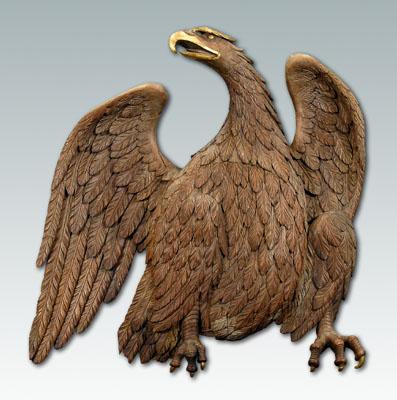 Monumental carved spread-wing