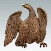 Monumental carved spread-wing