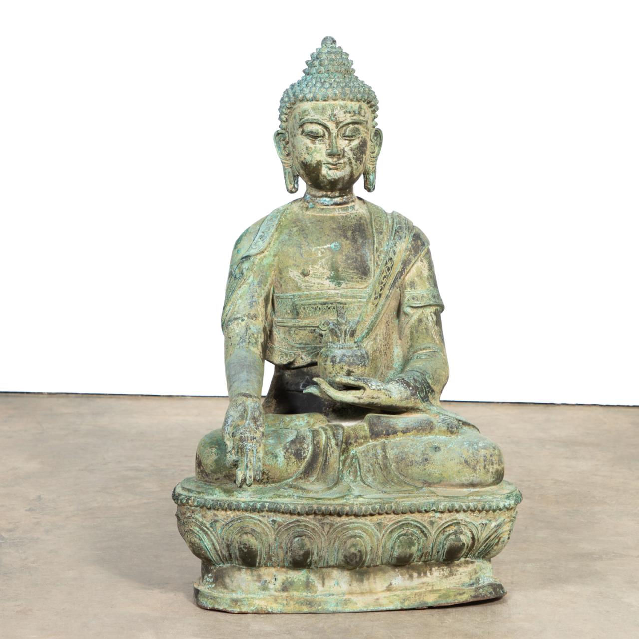 MONUMENTAL PATINATED METAL SEATED
