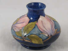Moorcroft. A squat vase the blue