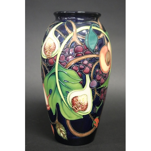 Moorcroft pottery blue ground vase,
