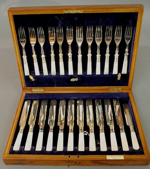 Mother-of-pearl handled and