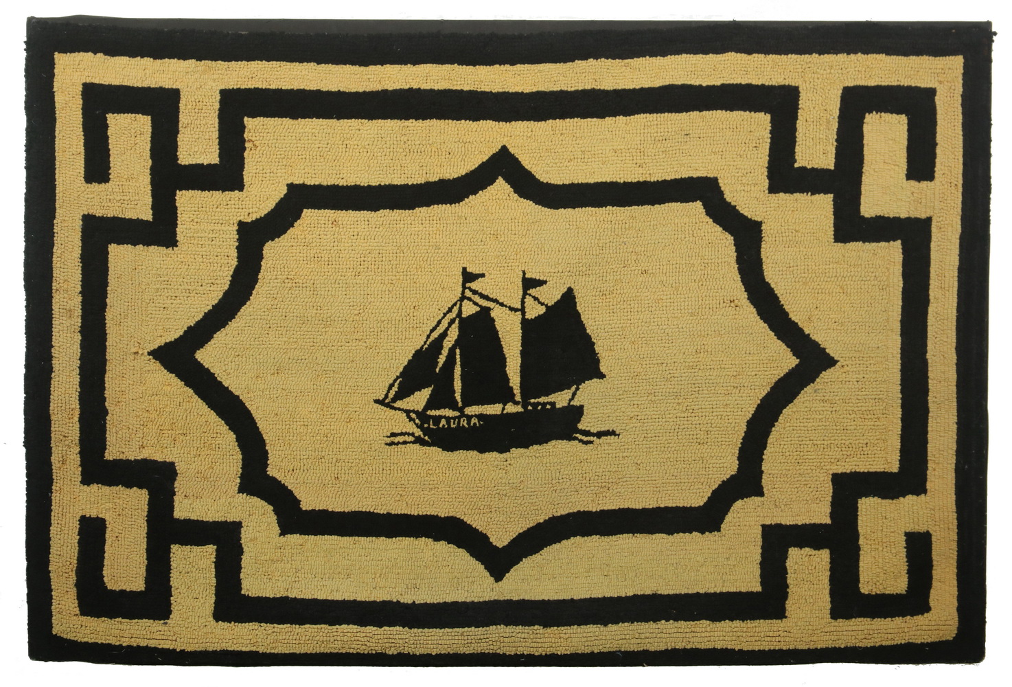 MOUNTED HOOKED RUG OF A SCHOONER
