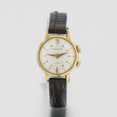 MOVADO LADIES' 14K ALARM WRIST