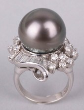 MRS. POWELL'S 2.4 CARAT DIAMON