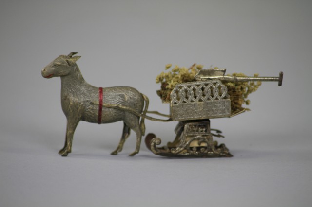 MULE PULLING SANTA'S GARDEN