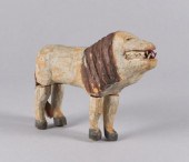 NAïVE LION CARVINGA naïvely ca