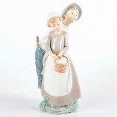 NAO BY LLADRO FIGURINE, BOY AN