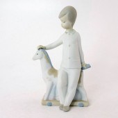 NAO BY LLADRO FIGURINE OF YOUN