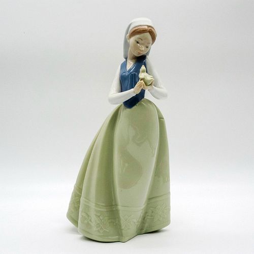 NAO BY LLADRO PORCELAIN FIGURINE,