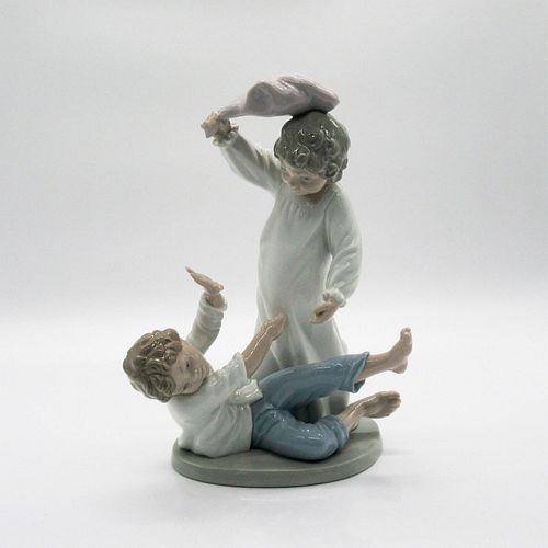 NAO BY LLADRO PORCELAIN FIGURINE,