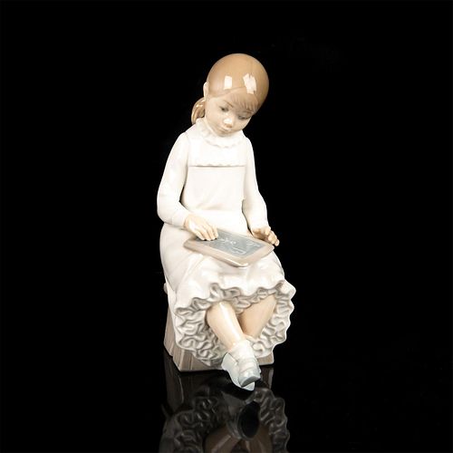 NAO BY LLADRO PORCELAIN FIGURINE,
