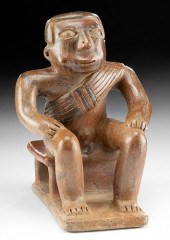 NARINO POTTERY SEATED COQUERO