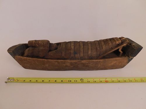 NATIVE AMERICAN BABY IN BOAT