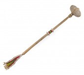 NATIVE AMERICAN THROWING STONE