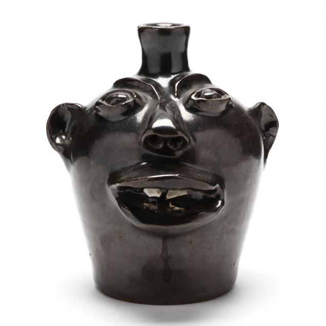 NC FOLK ART POTTERY FACE JUG,