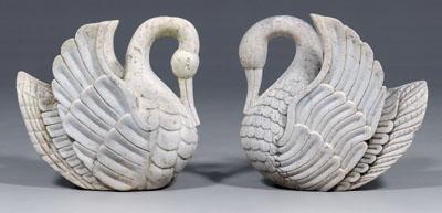 Near pair carved stone stylized