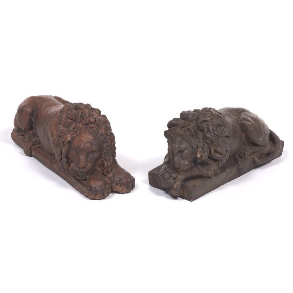 NEAR PAIR OF CAST COMPOSITE