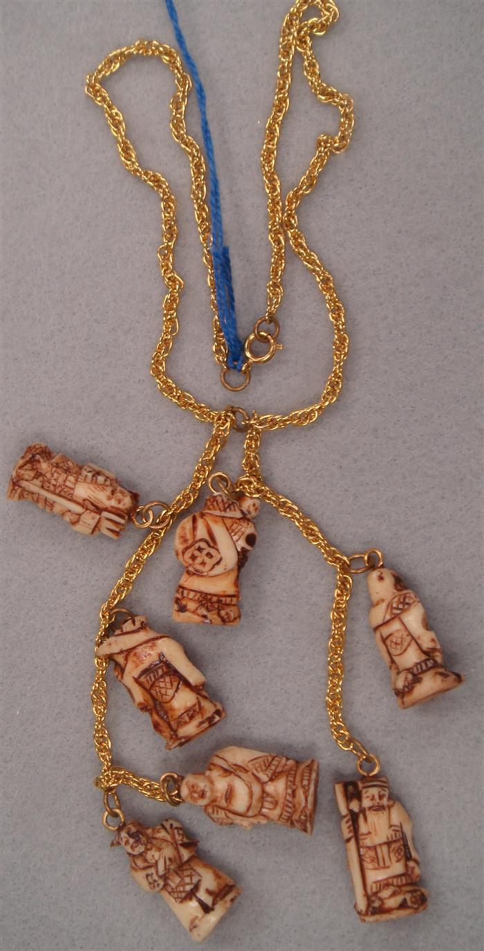 Necklace with Chinese figures  