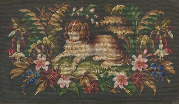 NEEDLEPOINT OF A SEATED SPANIEL