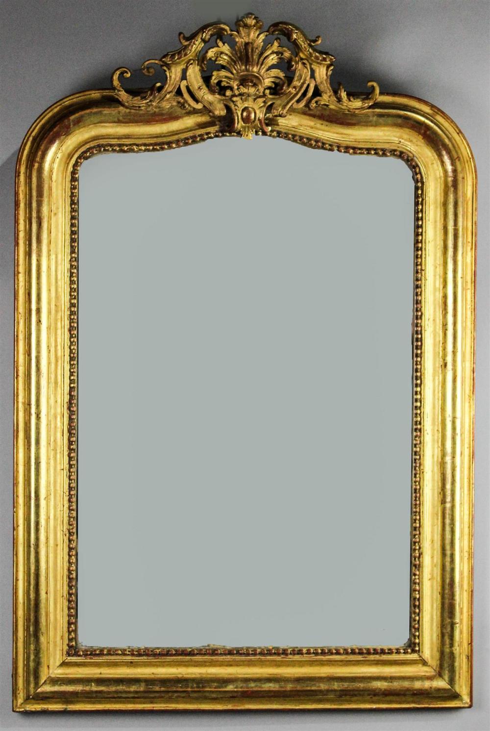 NEOCLASSICAL SERPENTINE GILT MIRROR