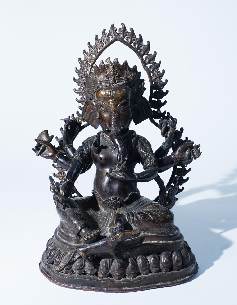 NEPALESE BRONZE FIGURE OF A SIX-ARM