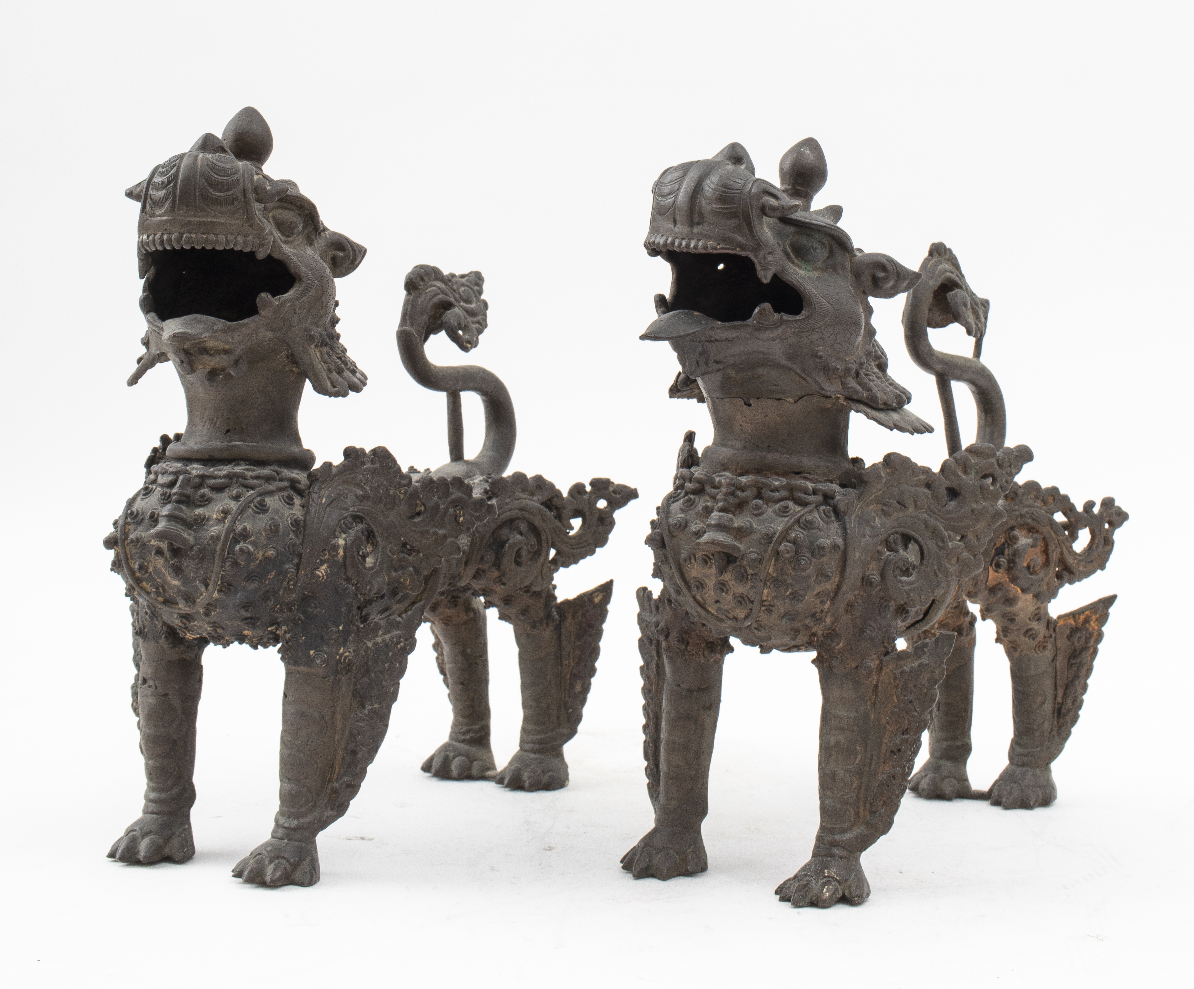 NEPALESE BRONZE LION SCULPTURES,