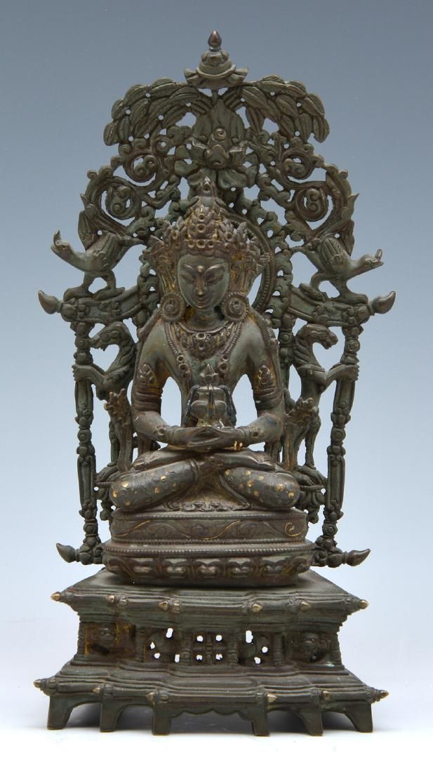 NEPALESE BRONZE SEATED FIGURE OF