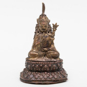 NEPALESE GILT-BRONZE FIGURE OF