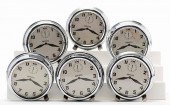 NEST OF ALARM CLOCKS. COLON: A