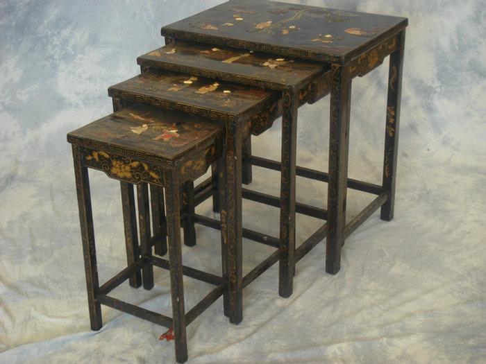 Nest of four black lacquer