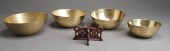 NEST OF FOUR CHINESE BRASS BOW