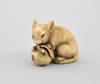 Netsuke of a Rat Nibbling Fruit
