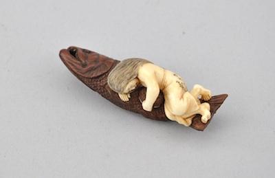Netsuke of a Sleeping Woman on a