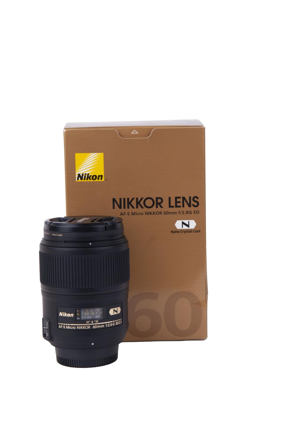 NIKON 60 LENSin retail packaging