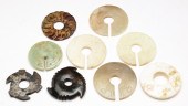 NINE ASIAN STONE DISKS. Twenti