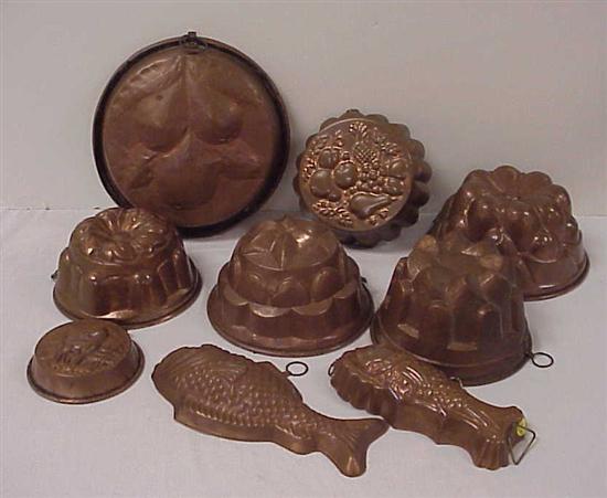 Nine assorted copper food molds 