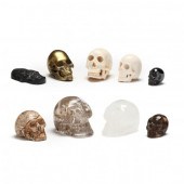 NINE ASSORTED MINIATURE SKULLS