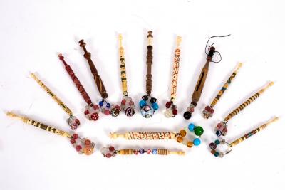Nine bone lace bobbins, one dated
