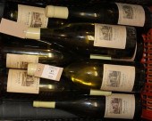 Nine bottles of Meursault Clos