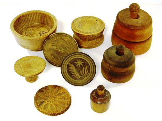 Nine butter molds  various sizes 