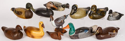 NINE CARVED AND PAINTED DUCK